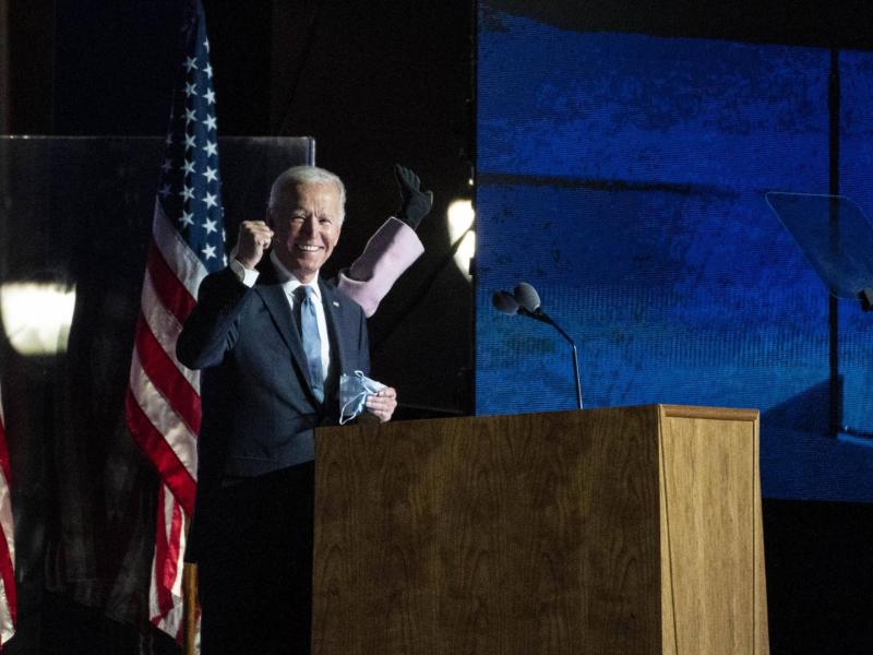 Joe Biden, 2020 Democratic presidential nominee, gestures towards supporters during an election night party in Wilmingt