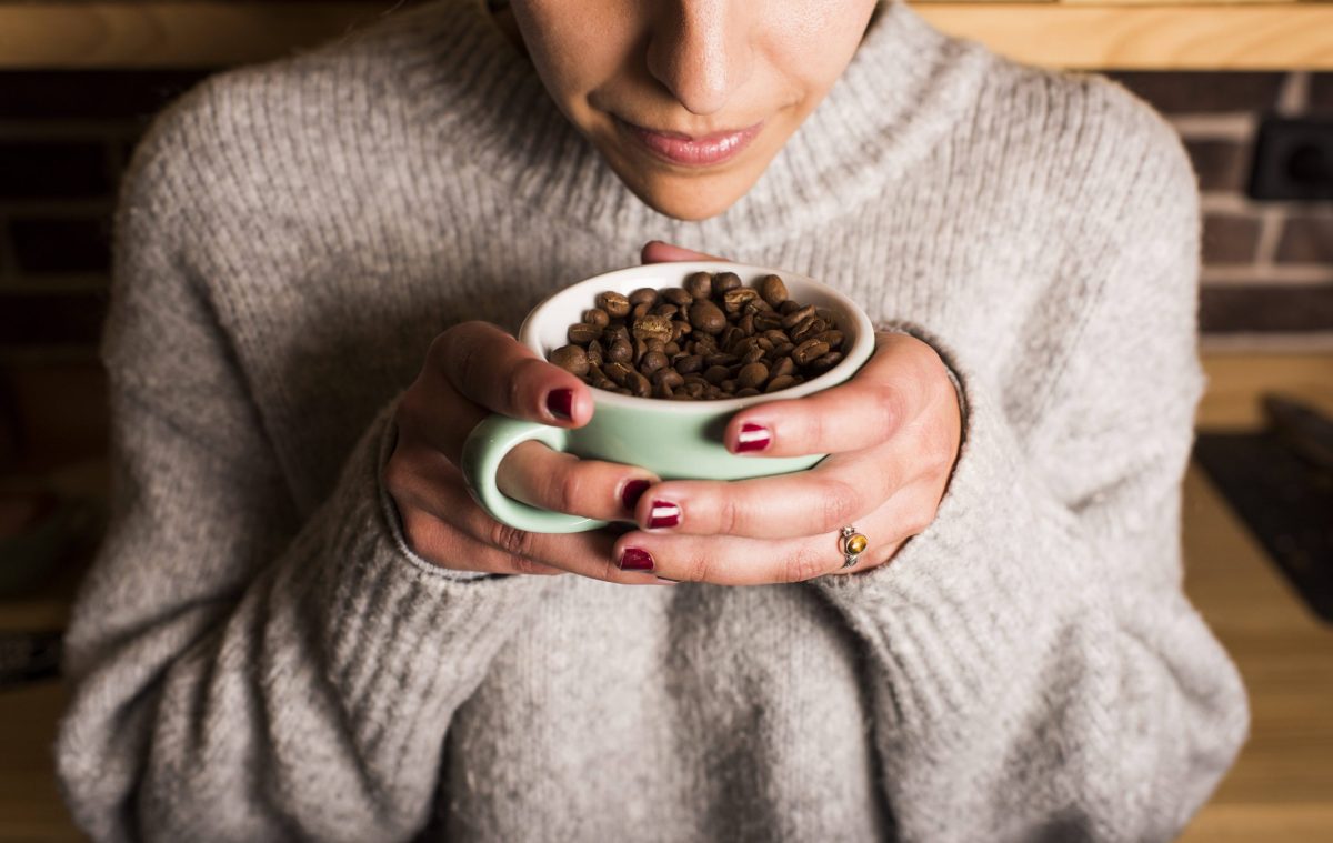 Wer hat Kaffee erfunden Frau Kaffeebohnen