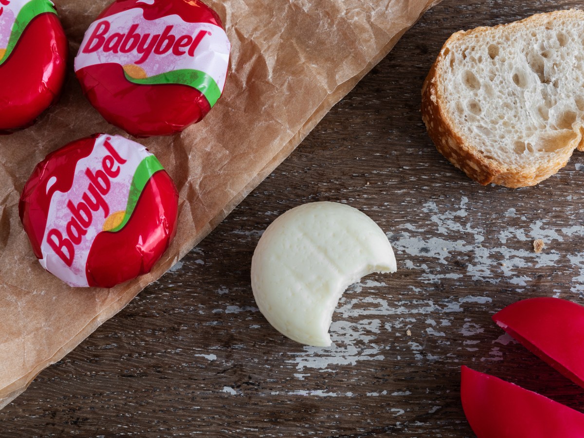 babybel cheese snack on rustic background kÃ¤se frÃ¼hstÃ¼ck essen